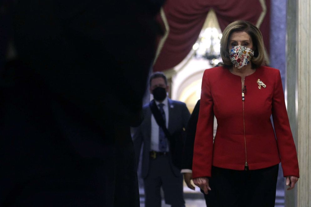 PHOTO: Speaker of the House Nancy Pelosi, D-Calif., walks in a hallway at the U.S. Capitol, Jan. 8, 2021, in Washington, D.C. 