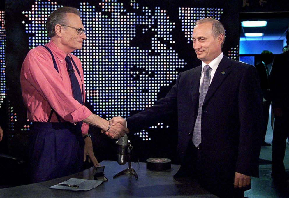 PHOTO: Russian President Vladimir Putin shakes hands with Larry King before a taping of 