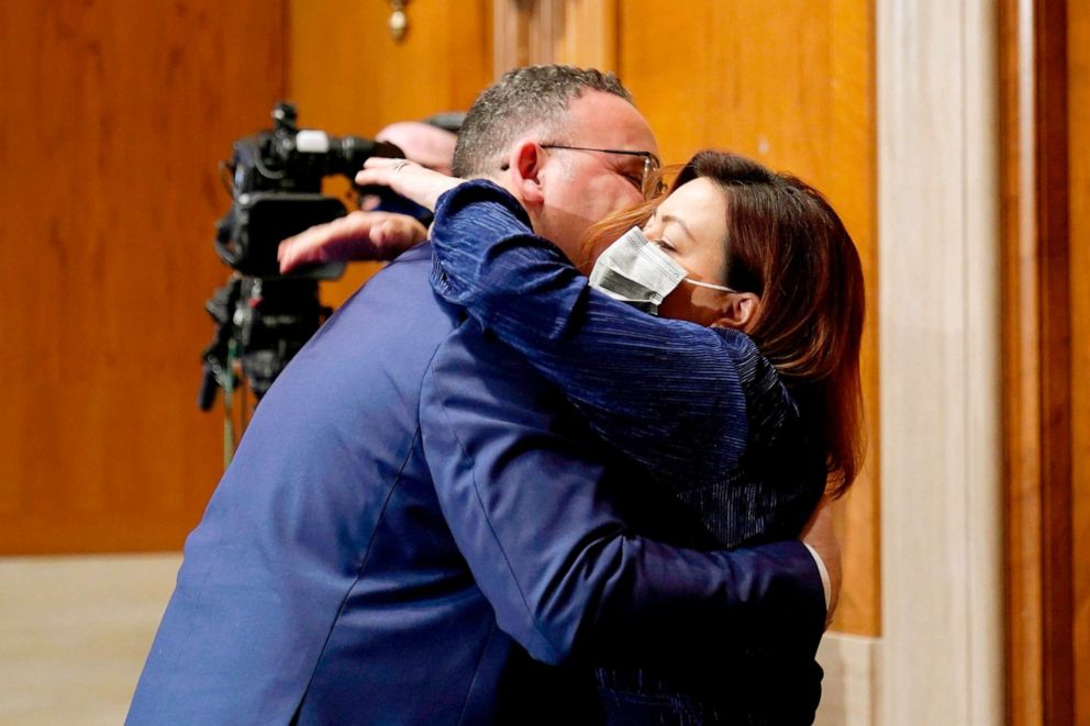 PHOTO: Miguel Cardona is hugged by his wife after his confirmation hearing to be Secretary of Education with the Senate Health, Education, Labor, and Pensions committee on Capitol Hill, Feb. 3, 2021.