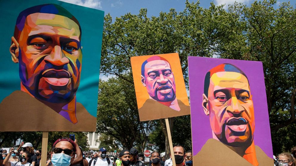 PHOTO: In this Aug. 28, 2020, file photo, protesters and activists carrying portraits of George Floyd attend the 'Commitment March: Get Your Knee Off Our Necks' march at the Lincoln Memorial in Washington, DC.
