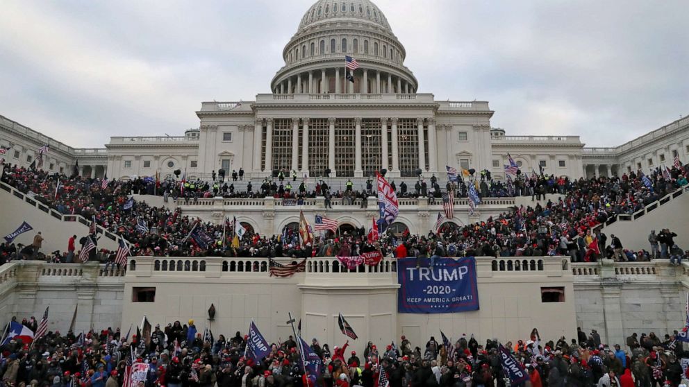 FILE PHOTO: A mob of supporters of U.S. President Donald Trump storm the U.S. Capitol Building in Washington, U.S., January 6, 2021. Picture taken January 6, 2021. 
