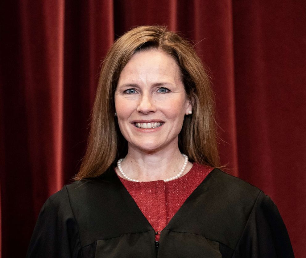 PHOTO: Associate Justice Amy Coney Barrett stands during a group photo of the Justices at the Supreme Court in Washington, D.C., April 23, 2021.