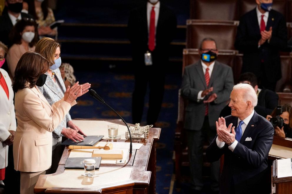 PHOTO: President Joe Biden turns to applaud Vice President Kamala Harris and Speaker of the House of Representatives Nancy Pelosi at the U.S. Capitol in Washington, April 28, 2021.