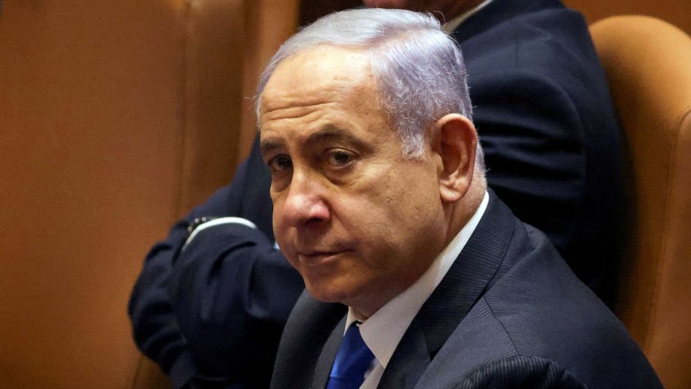 PHOTO: Israeli Prime Minister Benjamin Netanyahu looks on during a special session of the Knesset, Israel's parliament, in Jerusalem, June 13, 2021.
