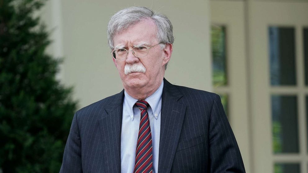 PHOTO: White House National Security Advisor John Bolton talks to reporters outside of the White House West Wing on April 30, 2019, in Washington, D.C.