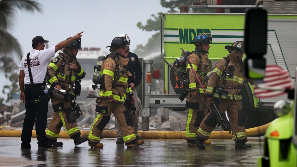 PHOTO: Miami-Dade Fire Rescue personnel continue search and rescue operations in the partially collapsed 12-story Champlain Towers South condo building on June 24, 2021, in Surfside, Fla.