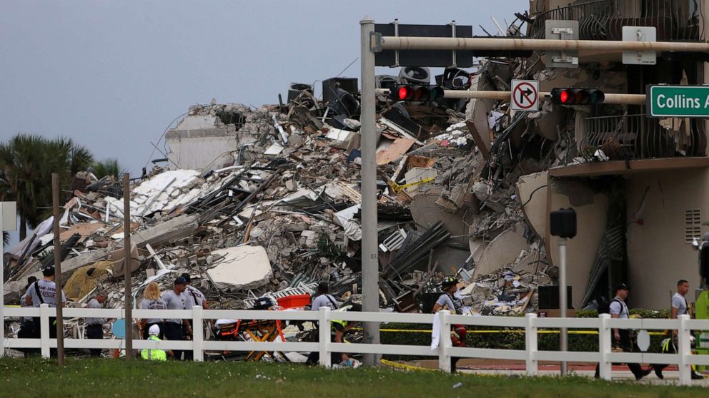 PHOTO: Rubble is piled high after the partial collapse of the 12-story Champlain Towers South condo building on June 24, 2021, in Surfside, Fla.