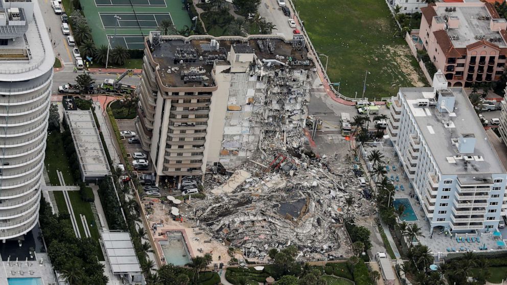 PHOTO: An aerial view showing a partially collapsed building in Surfside near Miami Beach, Fla., June 24, 2021.