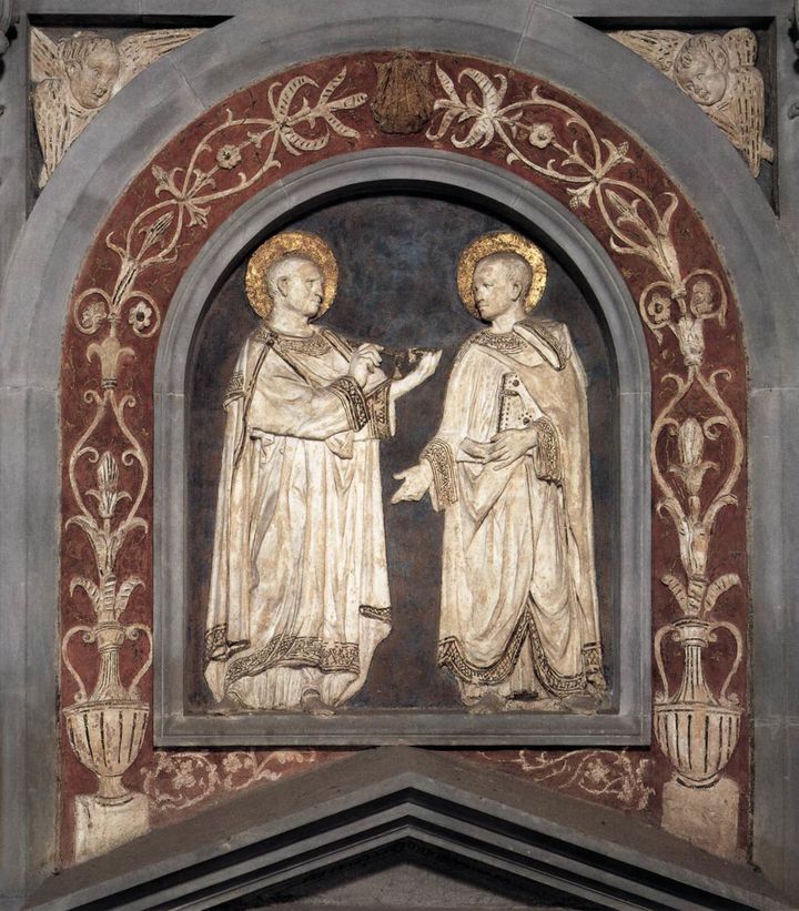 多纳泰罗，《圣科斯马斯和圣达米安》，1428-1435年，彩色陶土，佛罗伦萨圣洛伦佐教堂旧圣器室.