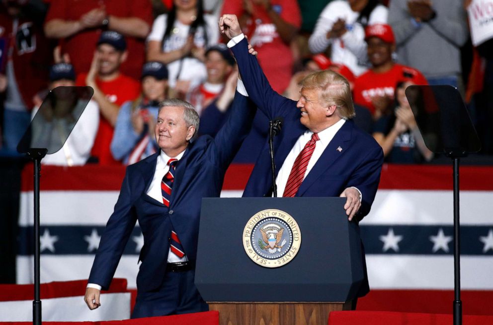 PHOTO: In this Feb. 28, 2020, file photo, Sen. Lindsey Graham stands onstage with President Donald Trump during a campaign rally in North Charleston, S.C.