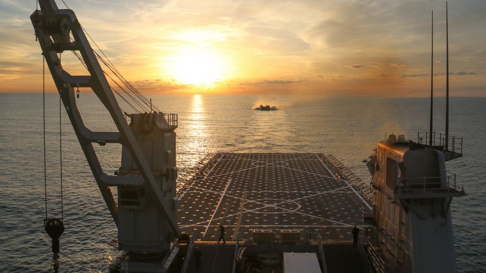 PHOTO: A landing craft air cushion (LCAC) approaches the well deck of the Harpers Ferry-Class dock landing ship USS Carter Hall, Feb. 7, 2023, in the Atlantic Ocean, during recovery efforts of the high altitude surveillance balloon brought down on Feb. 4.