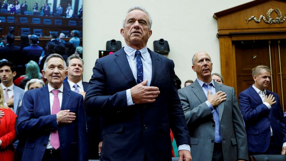 PHOTO: Democratic presidential Robert F. Kennedy Jr. stands to recite the Pledge of Allegiance at a House Judiciary Select Weaponization of the Federal Government Subcommittee hearing on Capitol Hill in Washington, D.C., July 20, 2023.