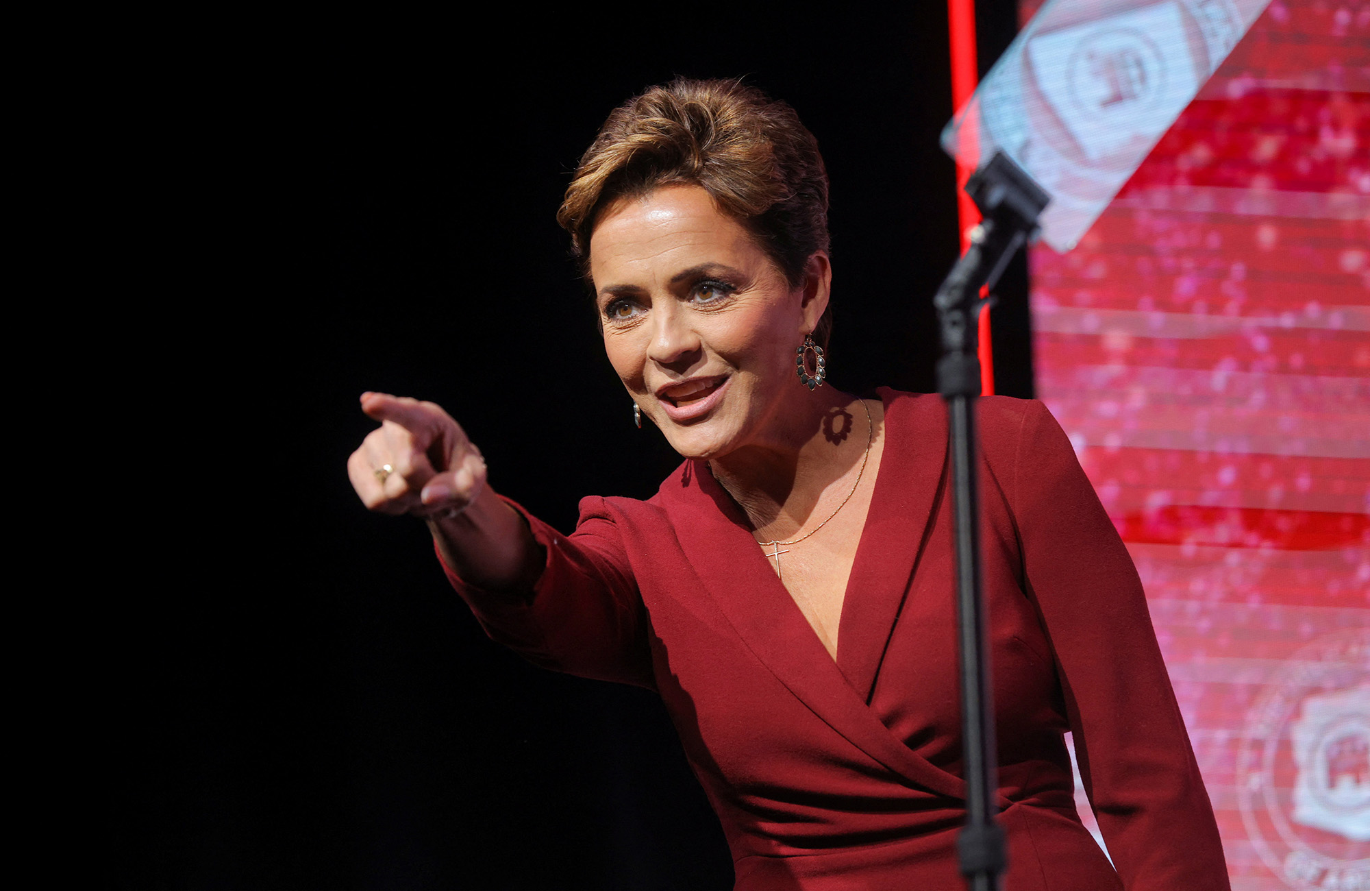 PHOTO: Republican candidate for Arizona Governor Kari Lake gestures as she attends  a midterm elections night rally in Scottsdale, Ariz., Nov. 8, 2022.