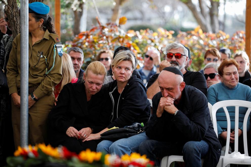 PHOTO: Mourners attend the funeral of Israeli soldier Staff sergeant David Bogdanovskyi, who was killed in the Gaza Strip during the Israeli army's ongoing ground operation in Gaza, at a cemetery in Haifa, Israel, Dec. 24, 2023. 